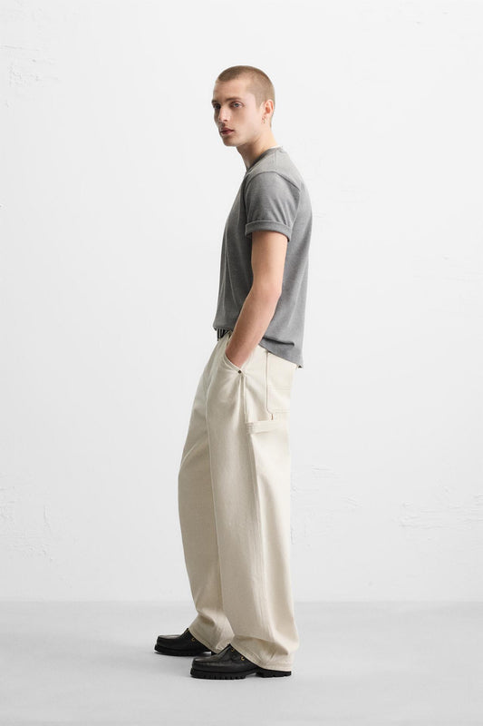 Relaxed Fit Carpenter Jeans with Multi-Functional Pockets and Washed Effect