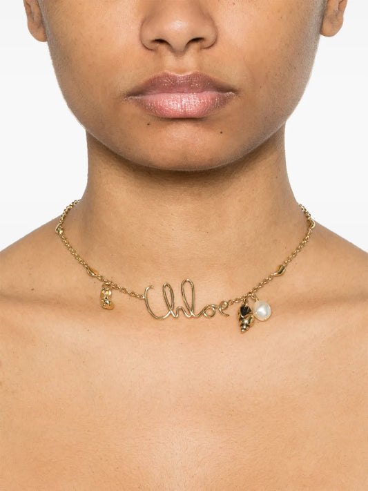 Chloé Gold Tone Necklace with Shell Pendant and Faux Pearl Details